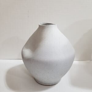 Textured terrcotta vase light gray with small black specks